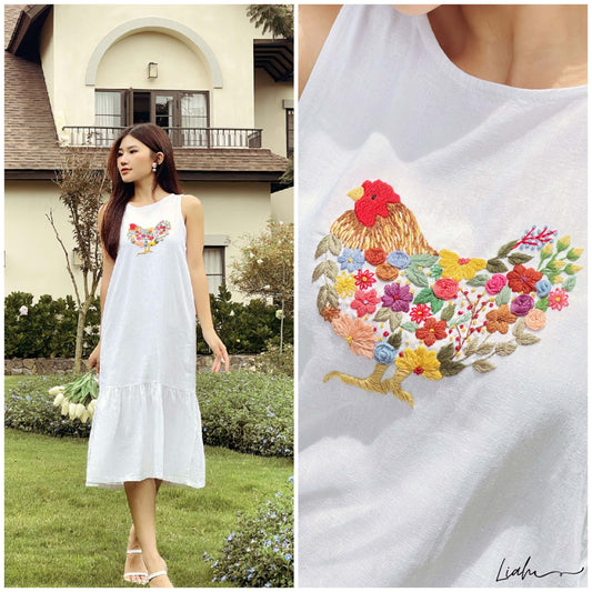 The hen embroidered linen dress