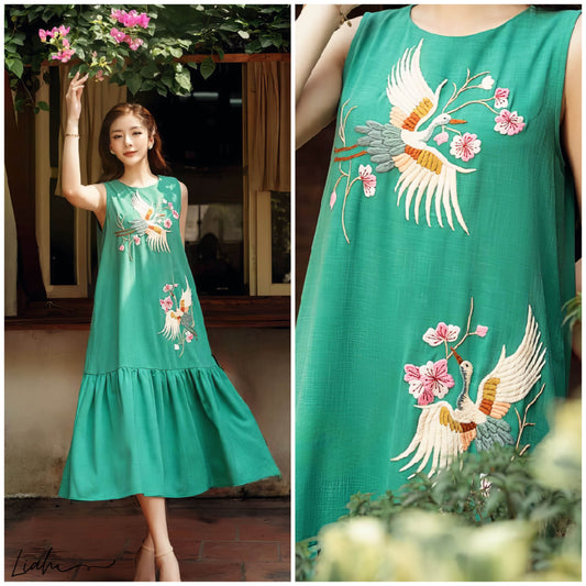 The crane bird and floral embroidered linen dress