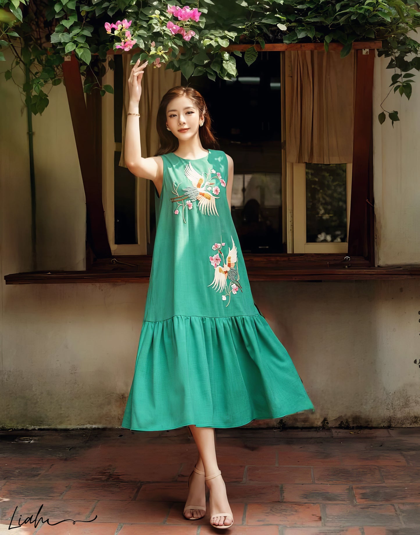 The crane bird and floral embroidered linen dress