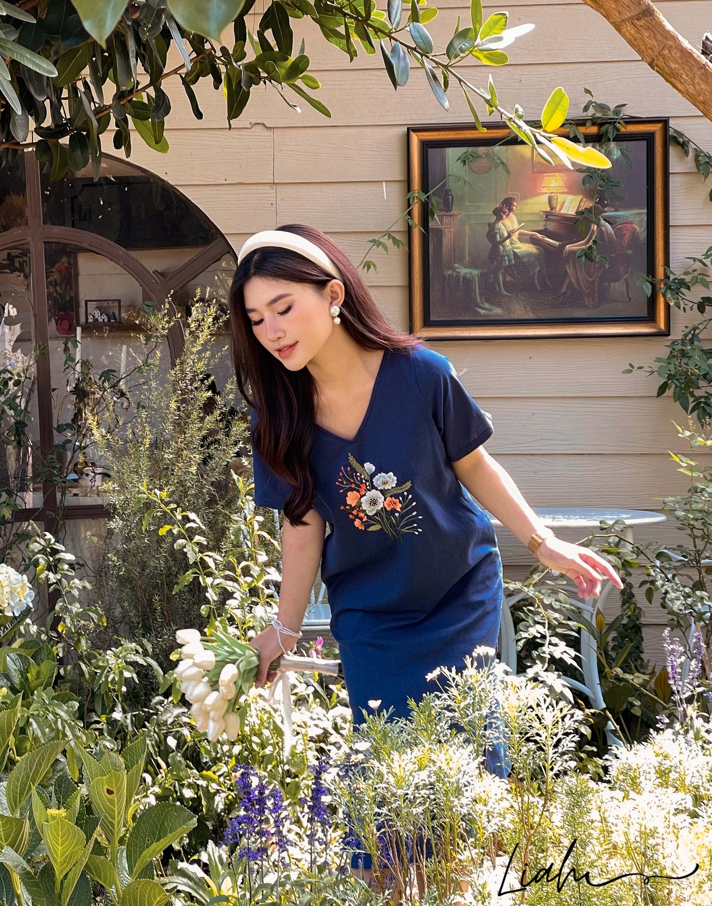 The floral hand embroidered linen dresses