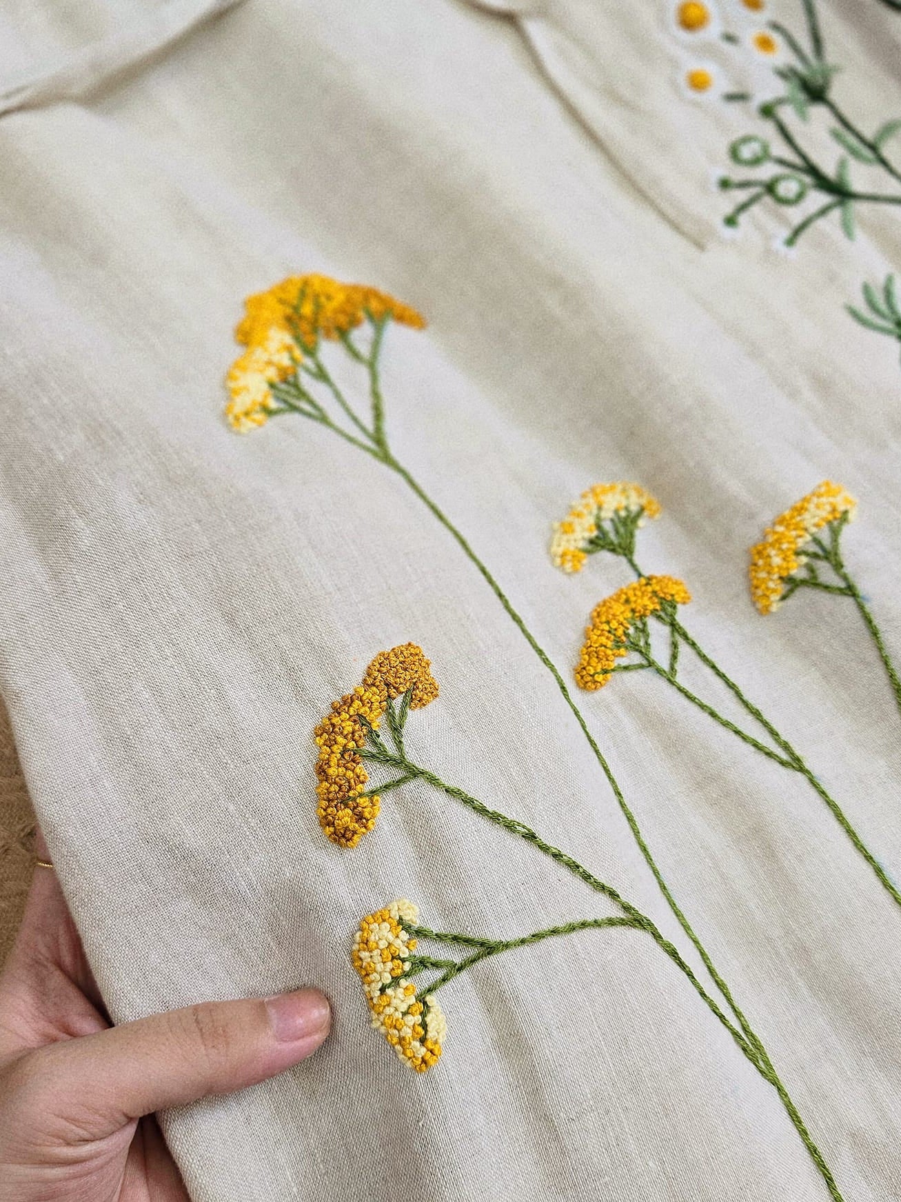 The dandelion flower hand- embroidered linen dress