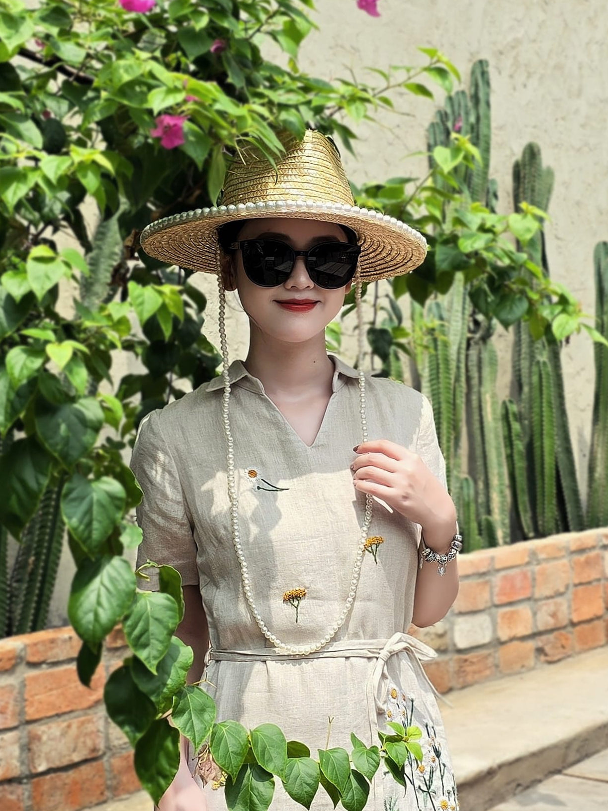 The dandelion flower hand- embroidered linen dress