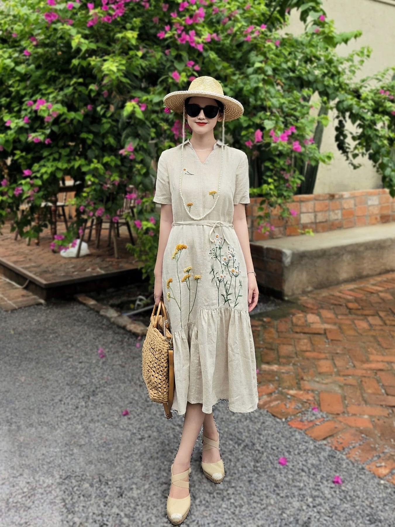 The dandelion flower hand- embroidered linen dress