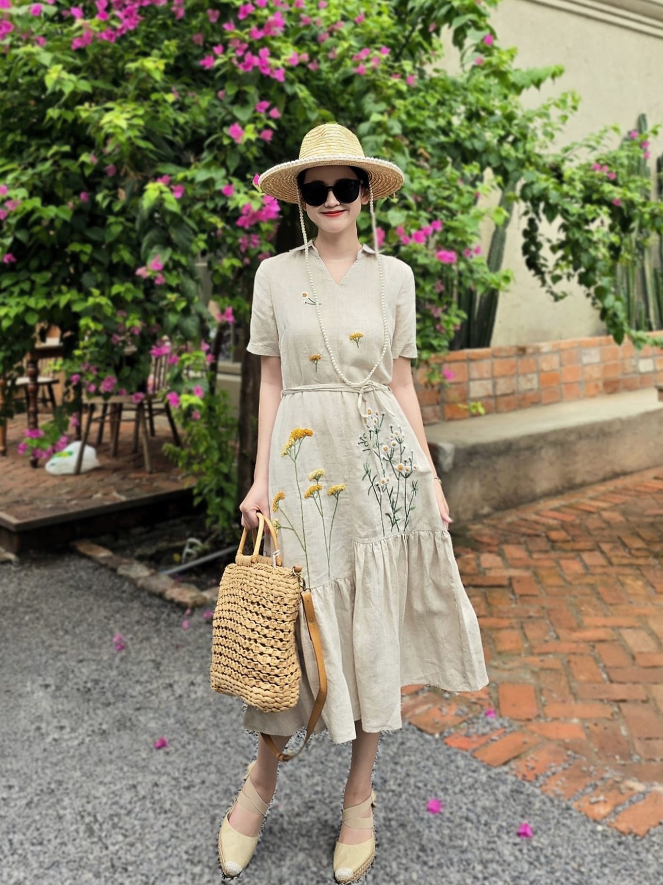 The dandelion flower hand- embroidered linen dress