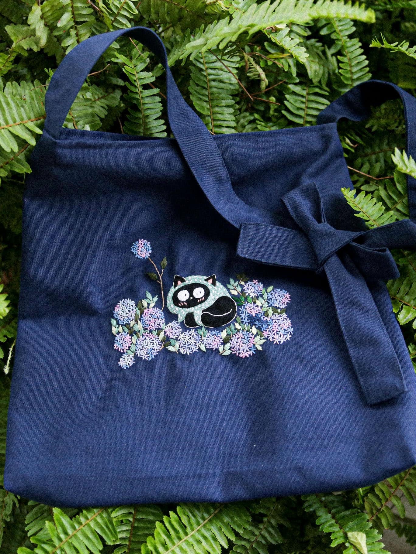 Hand-embroidered canvas tote handbag